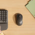 files/imgi_53_man-hands-next-to-m550-top-view-mouse-graphite-4.jpg
